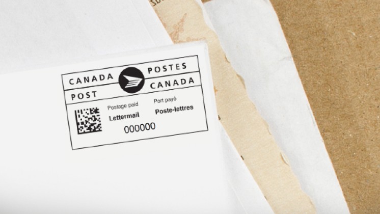A postal indicia printed on the upper right-hand corner of an envelope