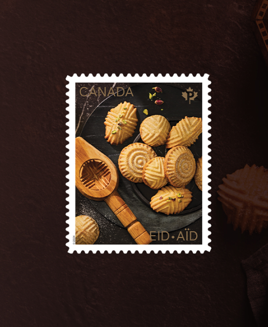 The Eid stamp issue features an image of Maamoul, a traditional Eid treat.